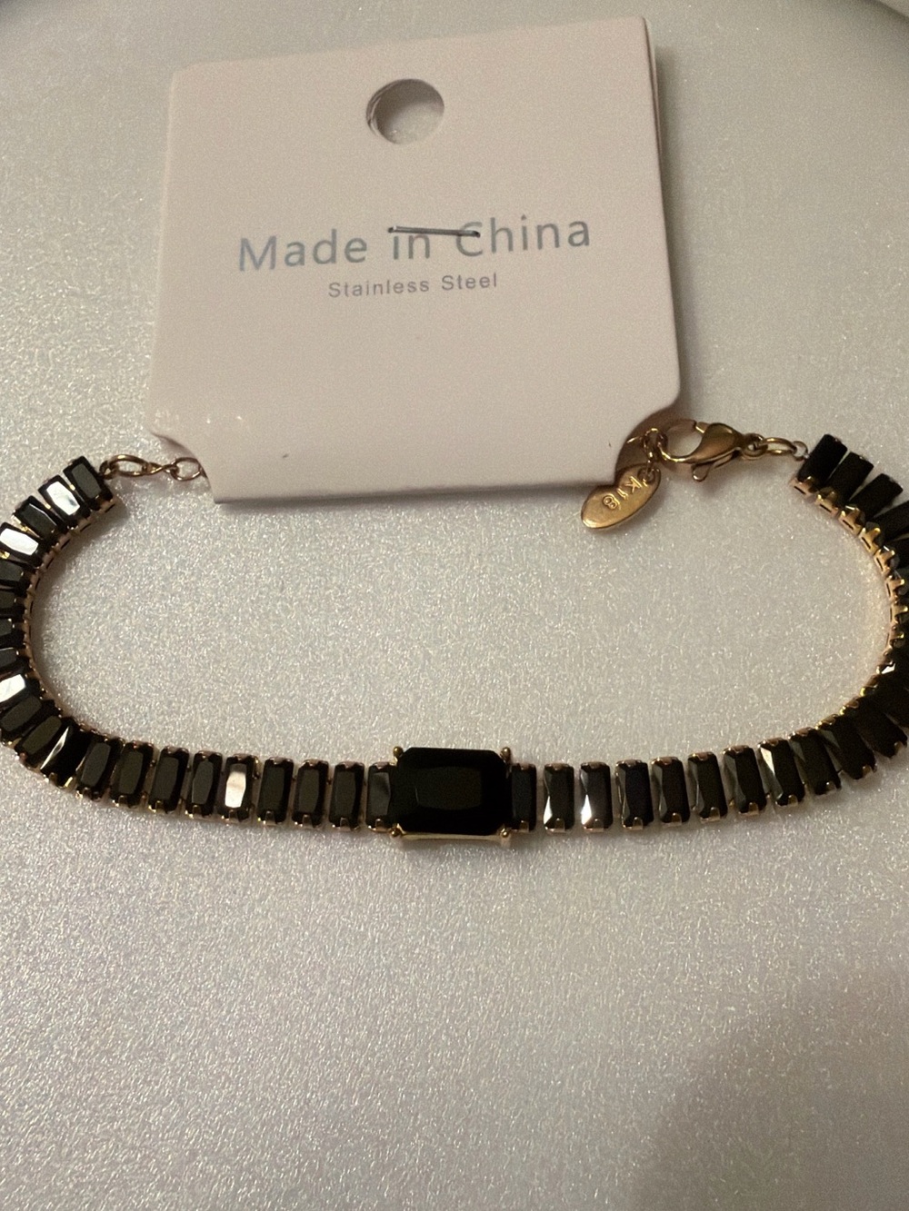 Gold Bracelet with Black Stones -